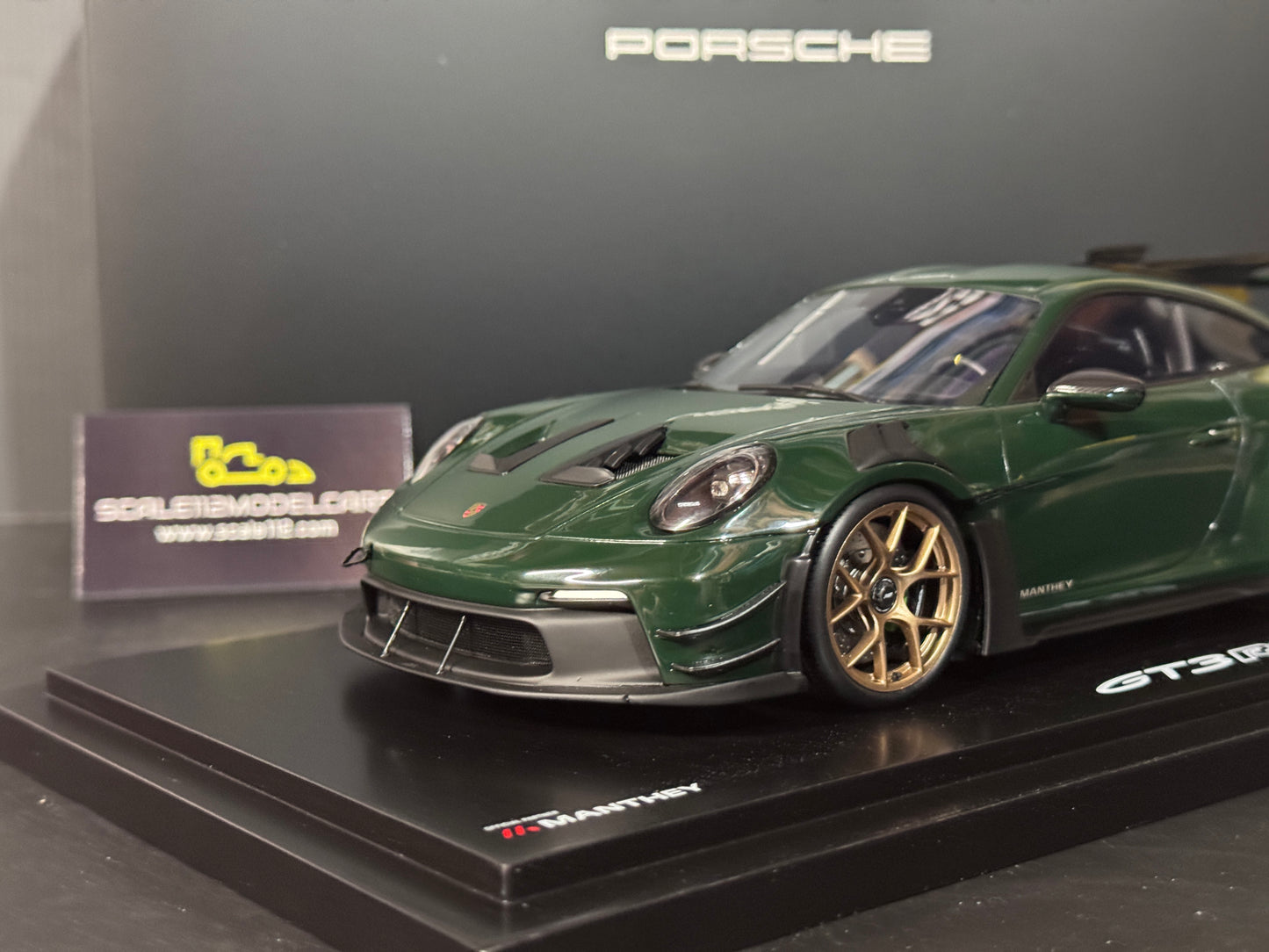 Porsche 911 GT3 RS Manthey in Brewster Green w/ Display Case 1/18 Spark Dealer Edition