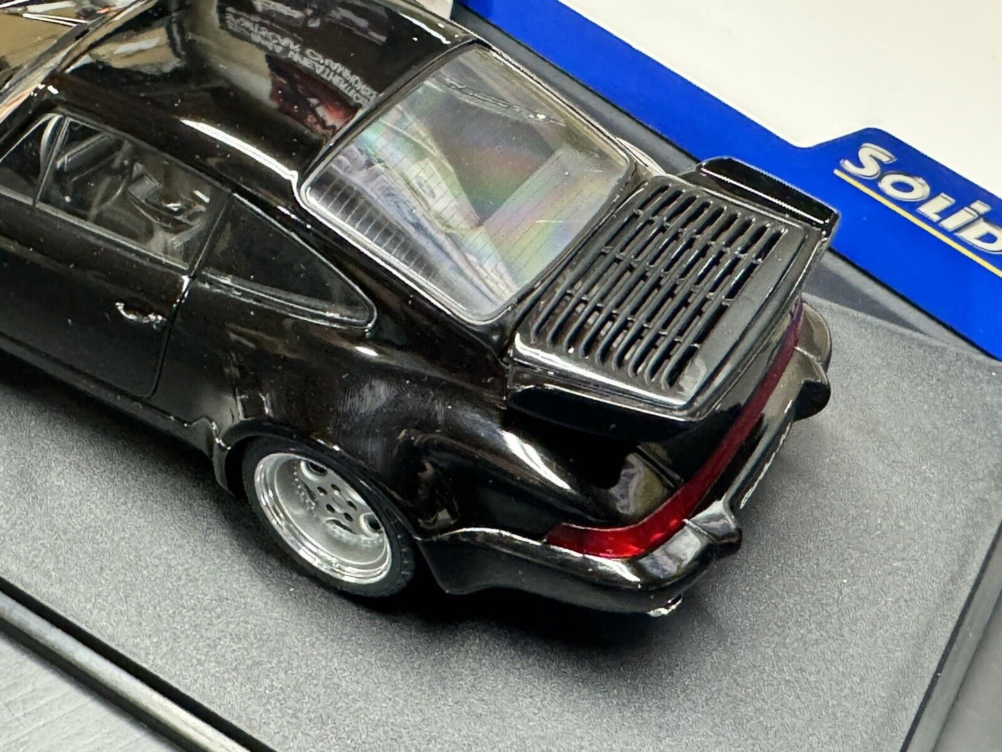 1/18 scale 1991 Porsche 964 911 Turbo 3.6 Black "Bad Boys" by SOLIDO