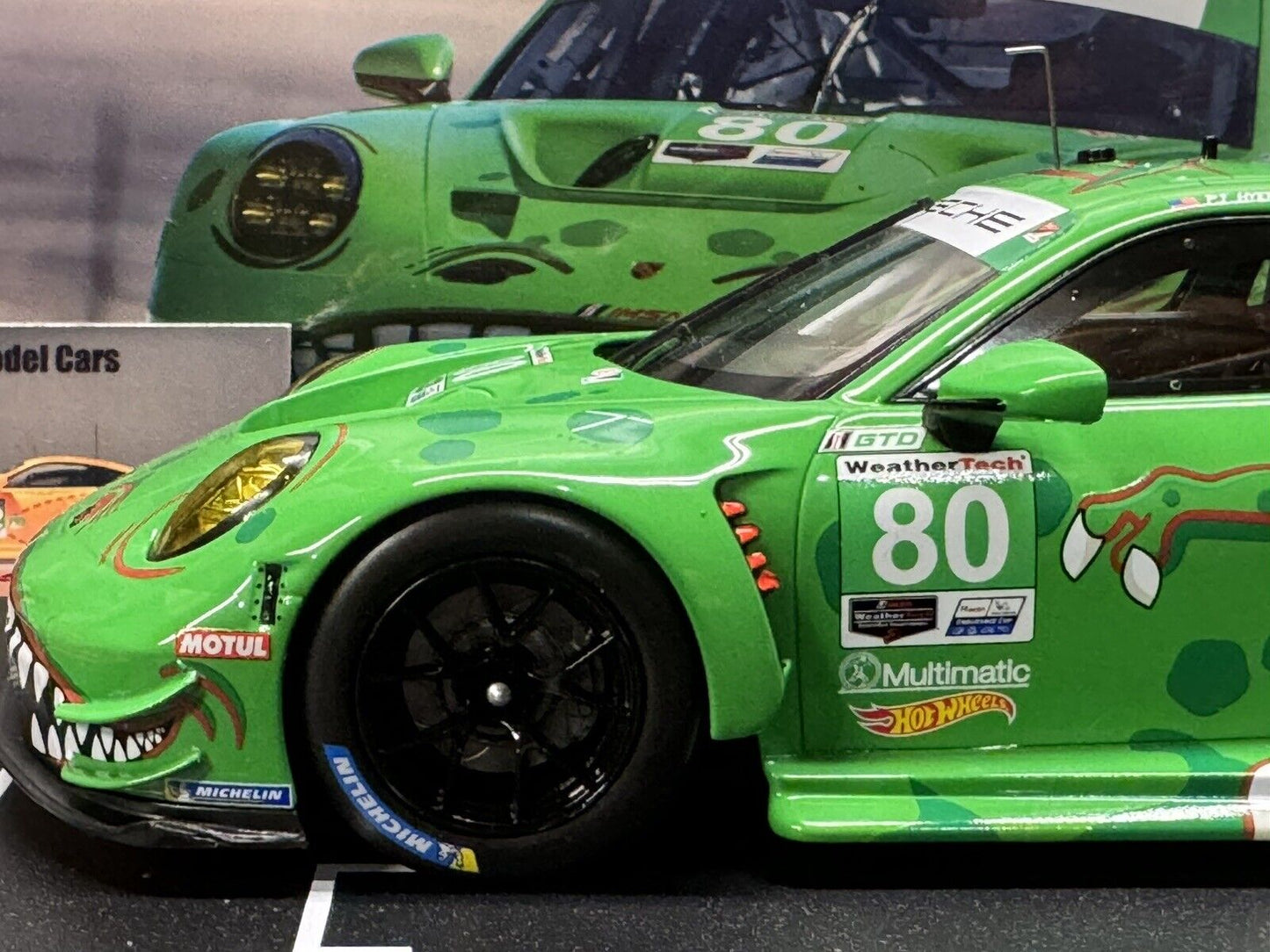 Porsche 992 GT3 R #80 12h Sebring IMSA 2023 AO Racing "Rexy" 1/18 Scale by IXO