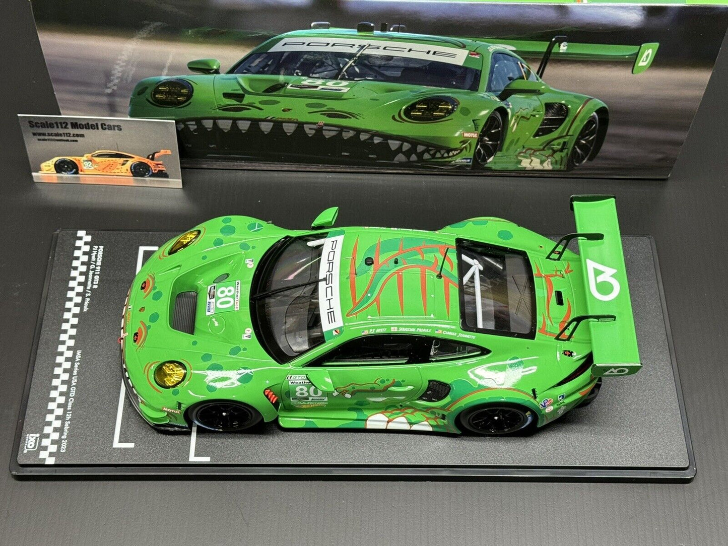 Porsche 992 GT3 R #80 12h Sebring IMSA 2023 AO Racing "Rexy" 1/18 Scale by IXO