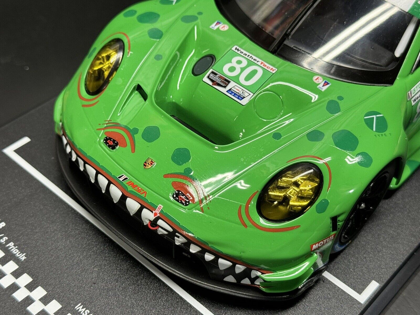 Porsche 992 GT3 R #80 12h Sebring IMSA 2023 AO Racing "Rexy" 1/18 Scale by IXO