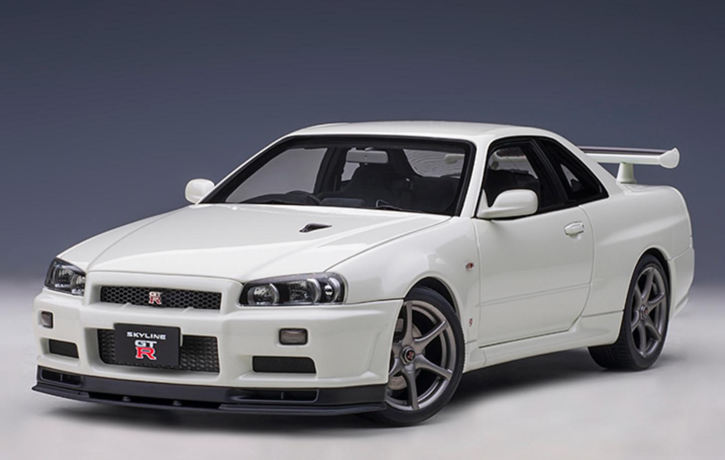 Nissan Skyline GT-R (R34) V-spec II White Pearl Model Car 1/18 Scale Autoart