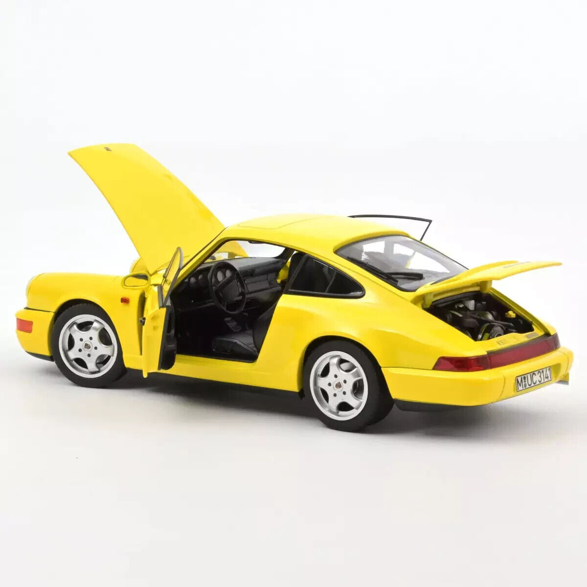 1/18 scale 1991 Porsche 964 Carrera 2 Yellow diecast model car by NOREV